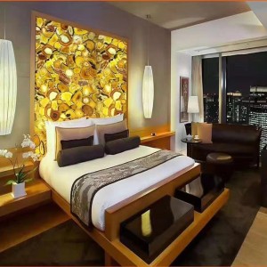 Yellow agate backlit hotel wall design